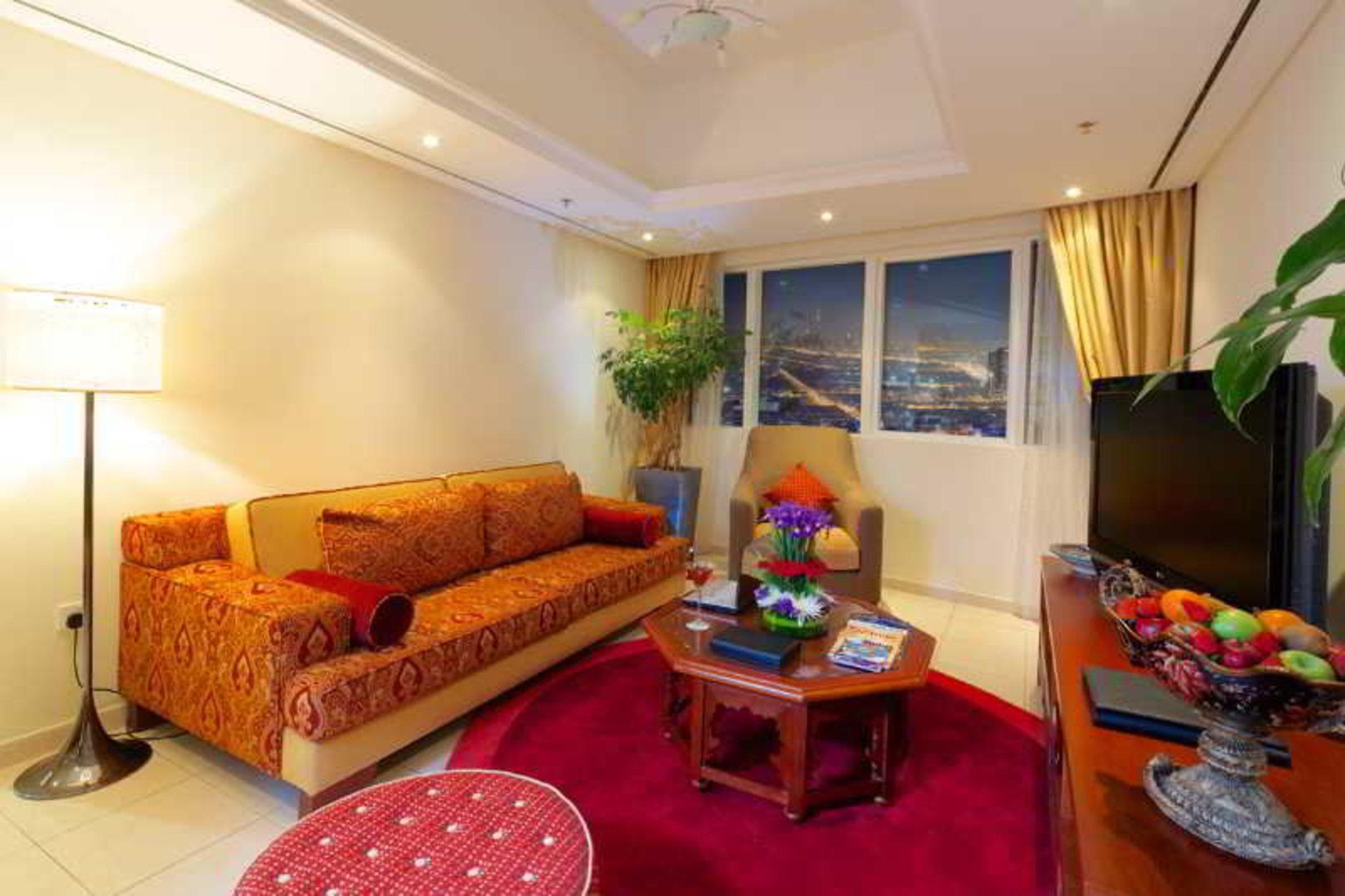 Tamani Marina Hotel & Apartments Dubaï Extérieur photo A living room in a hotel suite