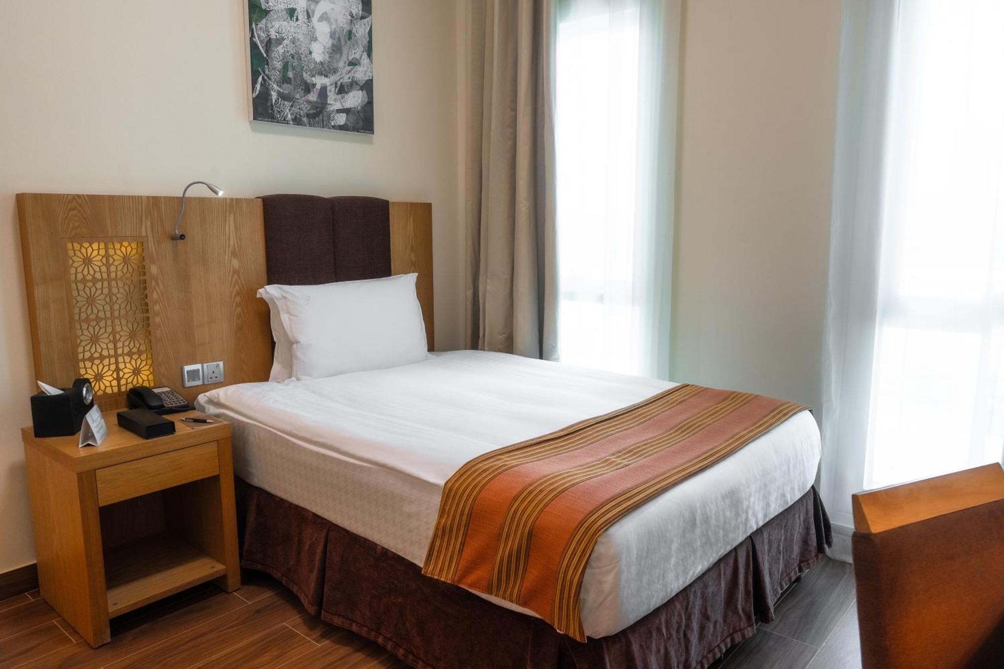 Tamani Marina Hotel & Apartments Dubaï Extérieur photo A single bed