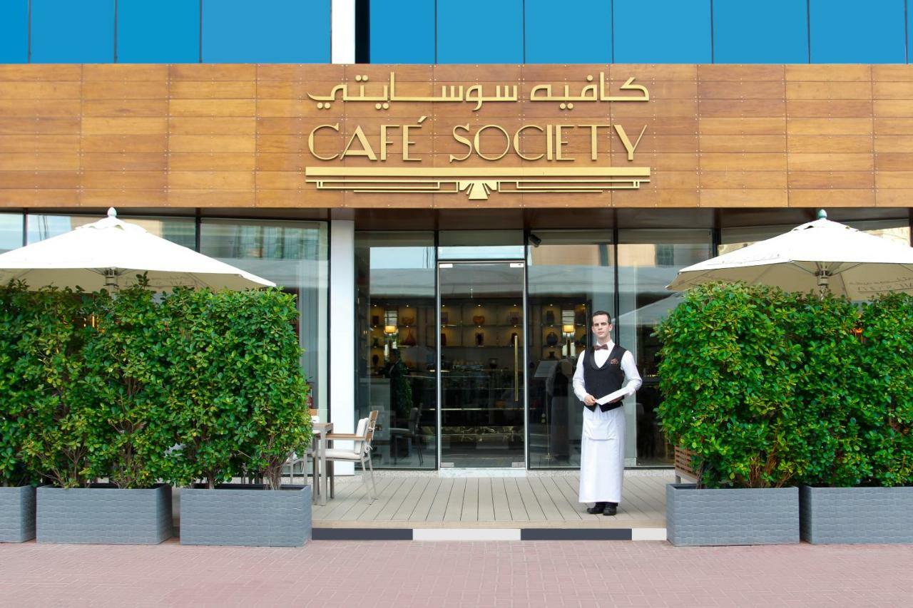 Tamani Marina Hotel & Apartments Dubaï Extérieur photo Café Society